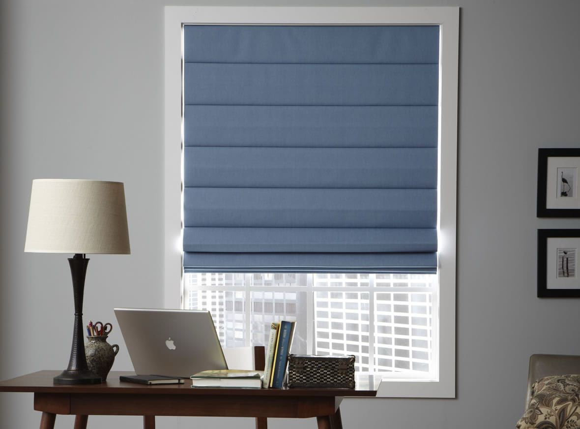 Blue Roman blinds in a home office